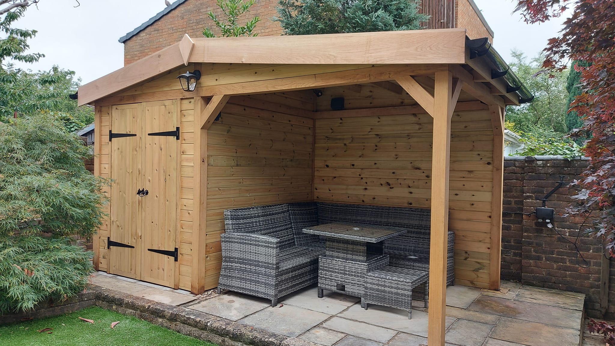 Completed timber storage and outdoor seating area.